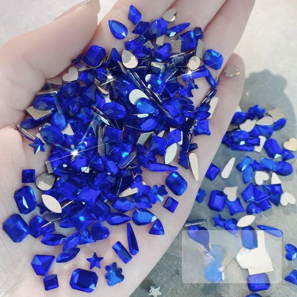 ۱۰۰ عدد نگین ناخن سبز، کریستال های تخت، جواهرات آبی رنگ با اشکال خاص، تزئینات سه بعدی ناخن، زیورآلات ناخن DIY (آبی تیره)