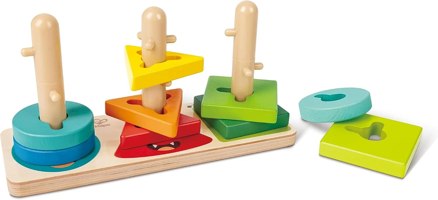 برج پازل هیولا Hape - اسباب بازی چوبی پیچشی با میخ برای تقویت مهارت های حرکتی ظریف، تشخیص رنگ و شکل | دارای پایه، برج ها و 9 بلوک | اسباب بازی سرگرم کننده برای کودکان نوپا 18 ماهه و بالاتر