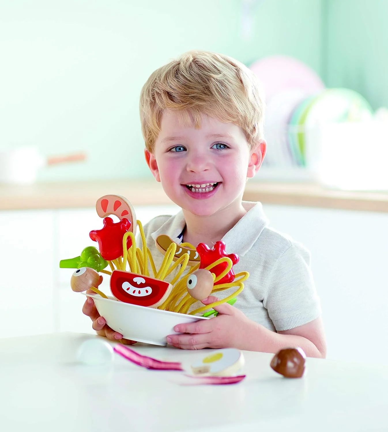 اسباب بازی اسپاگتی خنگولی Hape | مجموعه 13 تکه اسپاگتی چوبی، ست آشپزی رنگارنگ برای بازی کودکان 3 سال به بالا