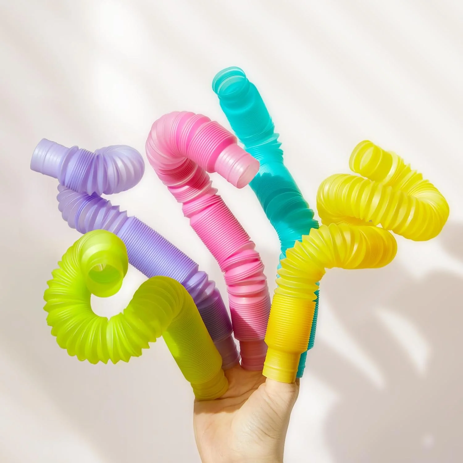 لوله‌های پاپ درخشان، اسباب‌بازی‌های کششی کودکان، اسباب‌بازی‌های حسی کودکان نوپا، هدیه جشن تولد، تزئینات مهمانی، اسباب‌بازی‌های درخشان در تاریکی برای فعالیت‌های یادگیری کودکان نوپا برای پسران و دختران 4 5 6 7 8 ساله