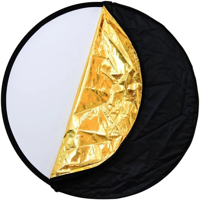 رفلکتور 5 در 1 پرومِیج 80 سانتیمتری - رفلکتور نورپردازی قابل حمل و تاشو با پنلهای طلایی، نقرهای، سفید، مشکی و شفاف برای استفاده در استودیو و فضای باز رفلکتور 5 در 1 پرومِیج 80 سانتیمتری - رفلکتور نورپردازی قابل حمل و تاشو با پنلهای طلایی، نقرهای، سفید، مشکی و شفاف برای استفاده در استودیو و فضای باز