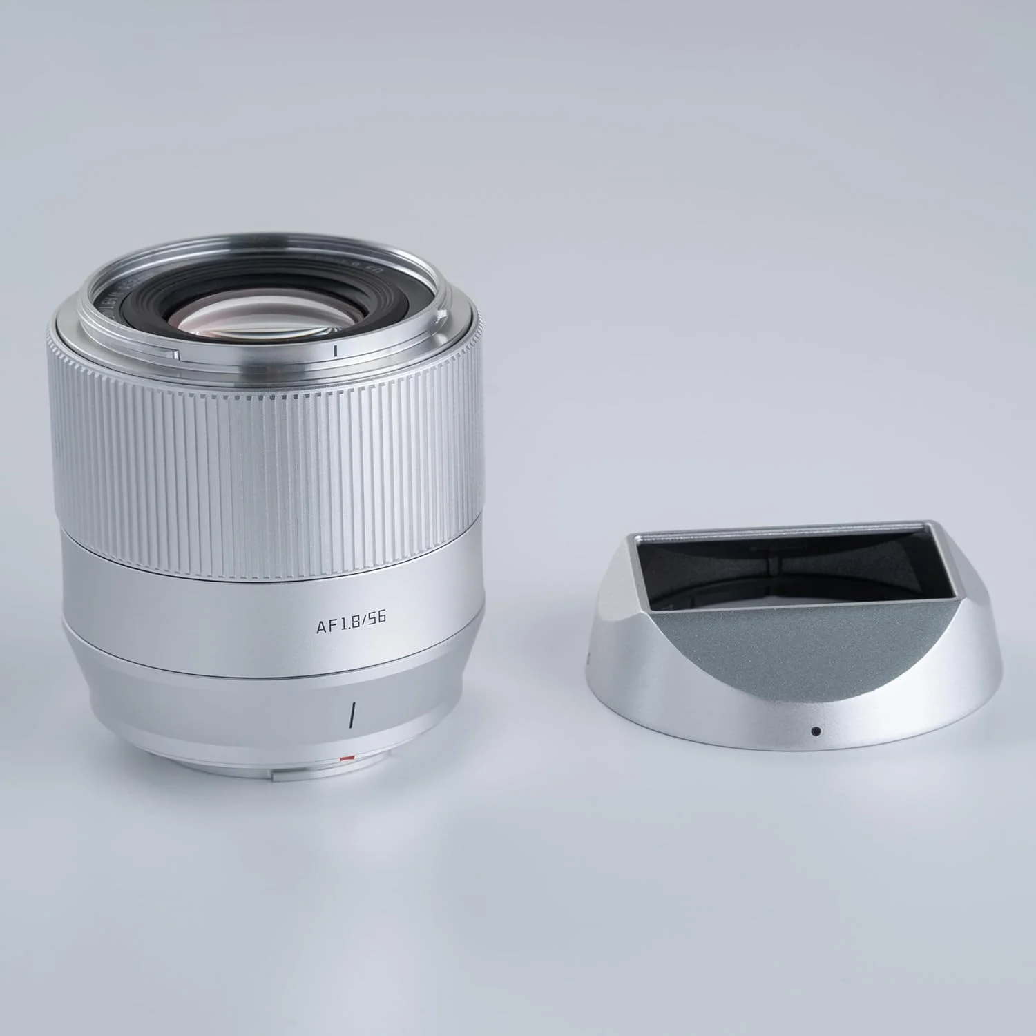لنز TTArtisan AF 56mm F1.8 فوجی XF، لنز 56mm f/1.8 مانت فوجی X، لنز APS-C برای مانت X مدل های XS10 X-A5 X-A7 X-M1 X-M2 X-E4 X-T1 X-T10 X-T2 X-T20 X-T3 X-T4 X-T100 (نقره ای) لنز TTArtisan AF 56mm F1.8 فوجی XF، لنز 56mm f/1.8 مانت فوجی X، لنز APS-C برای مانت X مدل های XS10 X-A5 X-A7 X-M1 X-M2 X-E4 X-T1 X-T10 X-T2 X-T20 X-T3 X-T4 X-T100 (نقره ای)