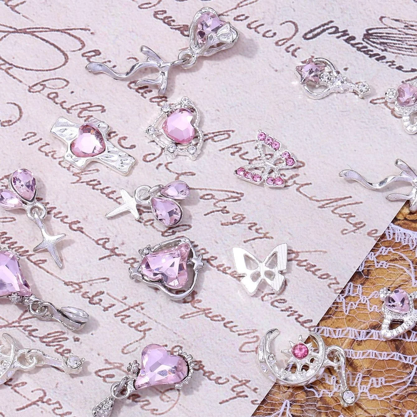 نگین ناخن یلاژوی 24 عددی - تزئینات سه بعدی ناخن با سنگ های قیمتی (پروانه، ستاره) - نگین های براق و زیبا برای طراحی ناخن و مانیکور (صورتی)