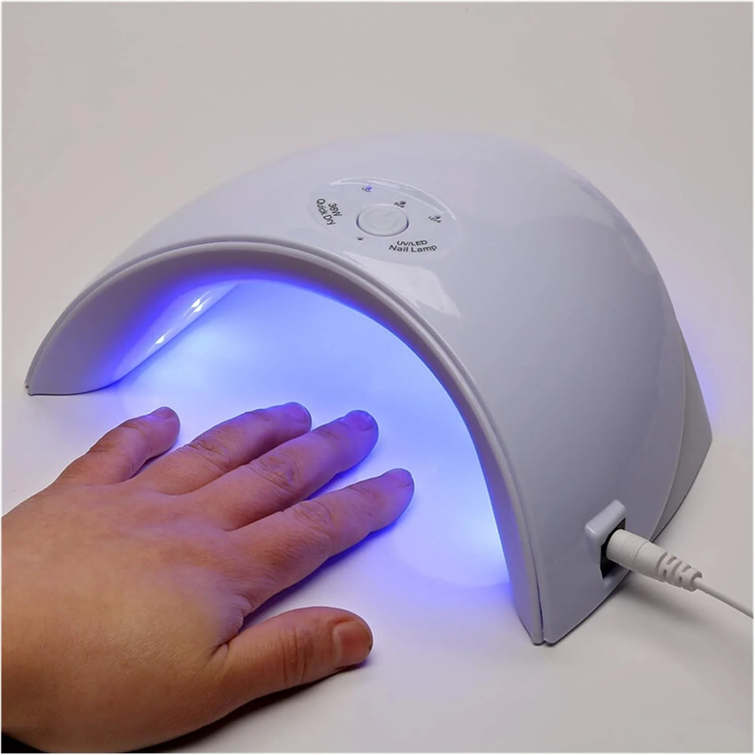 دستگاه خشک کن لاک ناخن LED مدل 36 وات با 12 لامپ LED، مناسب برای انواع لاک ژل، دارای دکمه 60 و 120 ثانیه و شارژ USB برای مانیکور و پدیکور