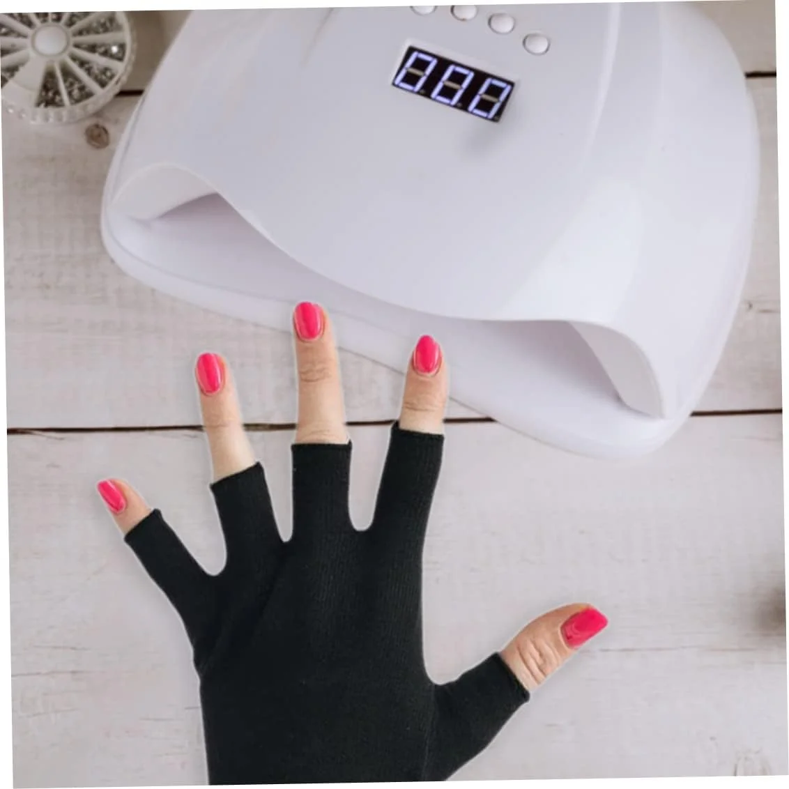 دستکش محافظ ناخن در برابر اشعه ماوراء بنفش، مناسب برای استفاده با دستگاه های خشک کننده لاک ژل، بدون انگشت، یک جفت، مشکی دستکش محافظ ناخن در برابر اشعه ماوراء بنفش، مناسب برای استفاده با دستگاه های خشک کننده لاک ژل، بدون انگشت، یک جفت، مشکی