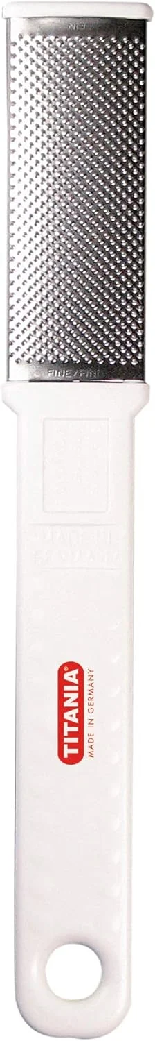 سوهان پدیکور تیتانیا مدل 3019، ضد زنگ، طول 18.5 سانتی متر، از جنس استیل ضد زنگ، دسته پلاستیکی با سوراخ آویز، ابزار پدیکور و مراقبت از پا سوهان پدیکور تیتانیا مدل 3019، ضد زنگ، طول 18.5 سانتی متر، از جنس استیل ضد زنگ، دسته پلاستیکی با سوراخ آویز، ابزار پدیکور و مراقبت از پا