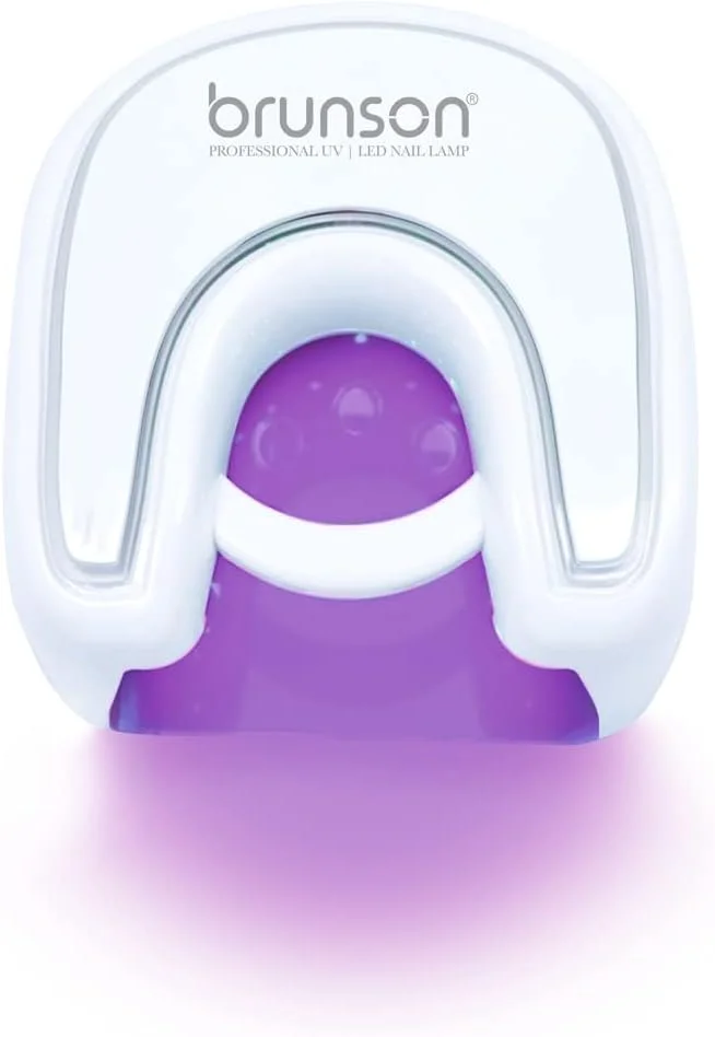 دستگاه خشک کن لاک ناخن UV LED برونسون 48 وات، دارای 21 لامپ LED برای لاک ژل به همراه دستکش های بدون انگشت ضد UV، 4 تنظیم تایمر، سنسور اتوماتیک، ابزار طراحی ناخن ژلی برای ناخن های دست و پا دستگاه خشک کن لاک ناخن UV LED برونسون 48 وات، دارای 21 لامپ LED برای لاک ژل به همراه دستکش های بدون انگشت ضد UV، 4 تنظیم تایمر، سنسور اتوماتیک، ابزار طراحی ناخن ژلی برای ناخن های دست و پا