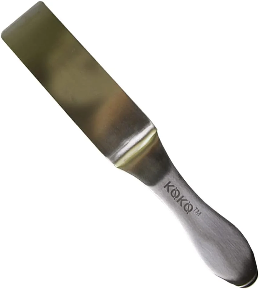 سوهان پدیکور استیل TNF KOKO. این سوهان پدیکور استیل، 100% بهداشتی، دارای طراحی ارگونومیک است و دسته آن چسبندگی و اهرم محکمی را فراهم می کند.