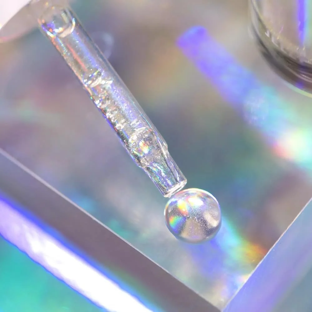 روغن ترمیم کننده ناخن ژله ای مجیک Catrice، شفاف، حاوی ویتامین، مغذی، ترمیم کننده، هولوگرافیک، وگان، بدون ذرات میکروپلاستیک، بدون مواد نگهدارنده، بدون پارابن، بسته 1 عددی (8 میلی لیتر)