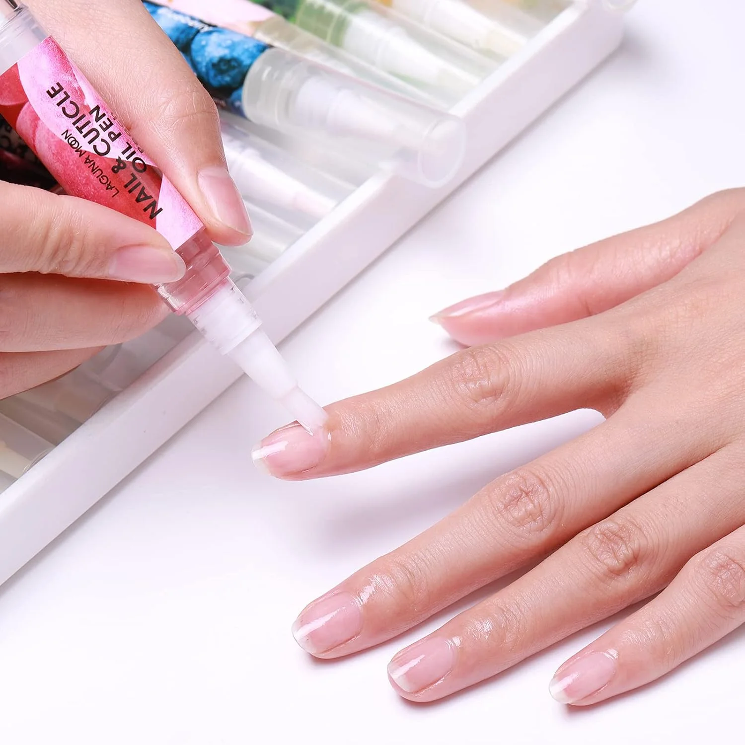 مجموعه ۱۰ عددی قلم روغن کوتیکول لاگونامون برای مراقبت از ناخن، قلم روغن ناخن ۵ میلی لیتری با مواد طبیعی برای مرطوب کردن و تغذیه ناخن ها و کوتیکول های خشک، روغن کوتیکول برای جلوگیری از ترک خوردن ناخن و آویزان شدن پوست مجموعه ۱۰ عددی قلم روغن کوتیکول لاگونامون برای مراقبت از ناخن، قلم روغن ناخن ۵ میلی لیتری با مواد طبیعی برای مرطوب کردن و تغذیه ناخن ها و کوتیکول های خشک، روغن کوتیکول برای جلوگیری از ترک خوردن ناخن و آویزان شدن پوست