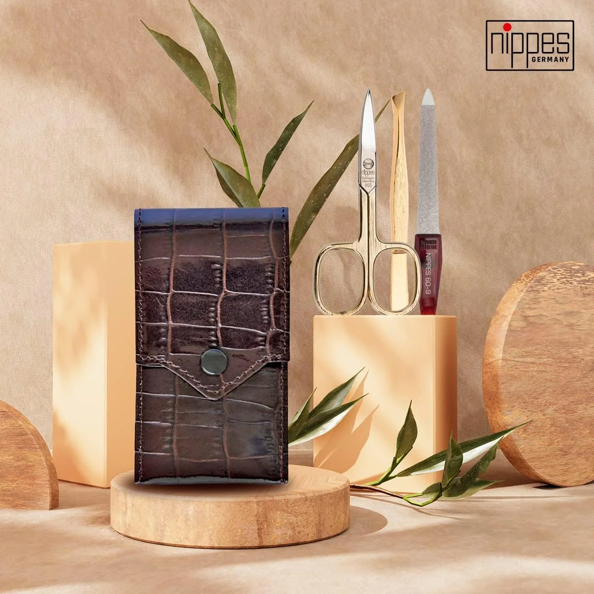 ست مانیکور ۳ تکه نیپِس سولینگن مدل Croco Premium Line، روکش نیکل و طلا، کیف چرمی طرح کروکودیل، ساخت آلمان ست مانیکور ۳ تکه نیپِس سولینگن مدل Croco Premium Line، روکش نیکل و طلا، کیف چرمی طرح کروکودیل، ساخت آلمان