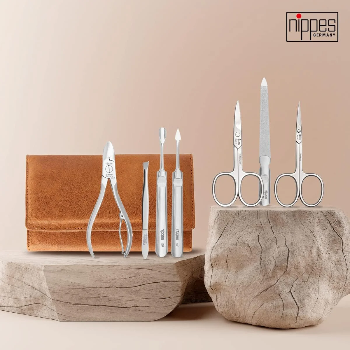 ست مانیکور 7 تکه نیپِس سولینگن، استیل ضد زنگ و بدون نیکل، کیف چرمی اصل گاوی با دکمه فشاری، نیپِس پریمیوم لاین، قهوه ای