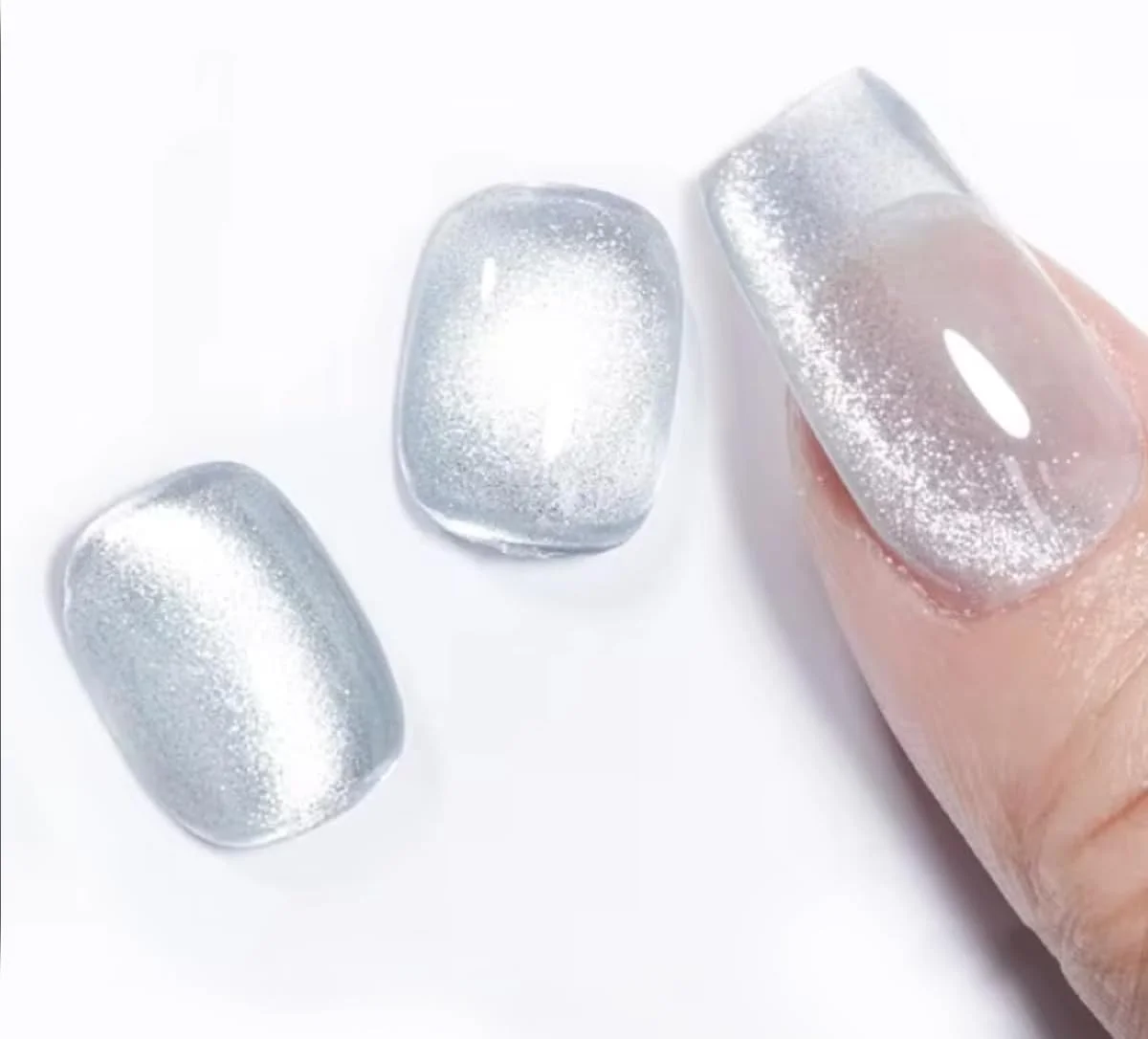 لاک ژل چشم گربه ای نقره ای برانسون - ژل رویه کروم مغناطیسی UV/LED | خیساندن آسان، درخشش ماندگار | طراحی ناخن با افکت کهکشانی | مانیکور با کیفیت سالن | ژل مگنتی چشم گربه ای برای ناخن BSCTG03 لاک ژل چشم گربه ای نقره ای برانسون - ژل رویه کروم مغناطیسی UV/LED | خیساندن آسان، درخشش ماندگار | طراحی ناخن با افکت کهکشانی | مانیکور با کیفیت سالن | ژل مگنتی چشم گربه ای برای ناخن BSCTG03