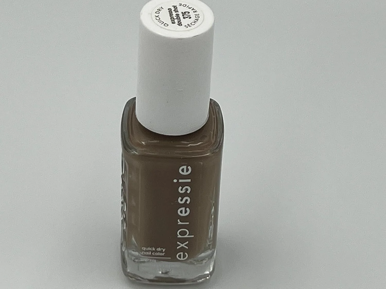 لاک ناخن سریع خشک شونده اسسی اکسپرسی، نسخه محدود مجموعه سرعت زندگی، رنگ قهوه ای-خاکستری با پوشش کرمی، اکسپرسو دابل شات، 9.8 میلی لیتر