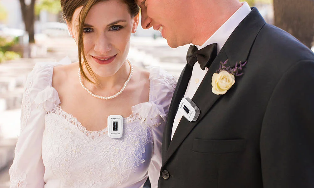 سیستم میکروفون بی سیم سارامونیک Blink 500 Pro B2، لاوالیر امنی (TX+TX+RX)، نصب روی دوربین دیجیتال برای 2 نفر، 8 ساعت عمر باتری، جفت شدن آسان با یک دکمه، ورودی میکروفون و لاین، سفید | Blink500ProB2W