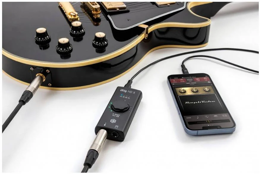 اینترفیس گیتار IK Multimedia iRig HD X برای آیفون، آیپد، مک و کامپیوتر، اینترفیس گیتار قابل حمل USB با تبدیل 24 بیتی/96 کیلوهرتز A/D، پری امپ ساز Hi-Z، خروجی های آمپلی فایر و هدفون، TONEX SE و آمپ اینترفیس گیتار IK Multimedia iRig HD X برای آیفون، آیپد، مک و کامپیوتر، اینترفیس گیتار قابل حمل USB با تبدیل 24 بیتی/96 کیلوهرتز A/D، پری امپ ساز Hi-Z، خروجی های آمپلی فایر و هدفون، TONEX SE و آمپ
