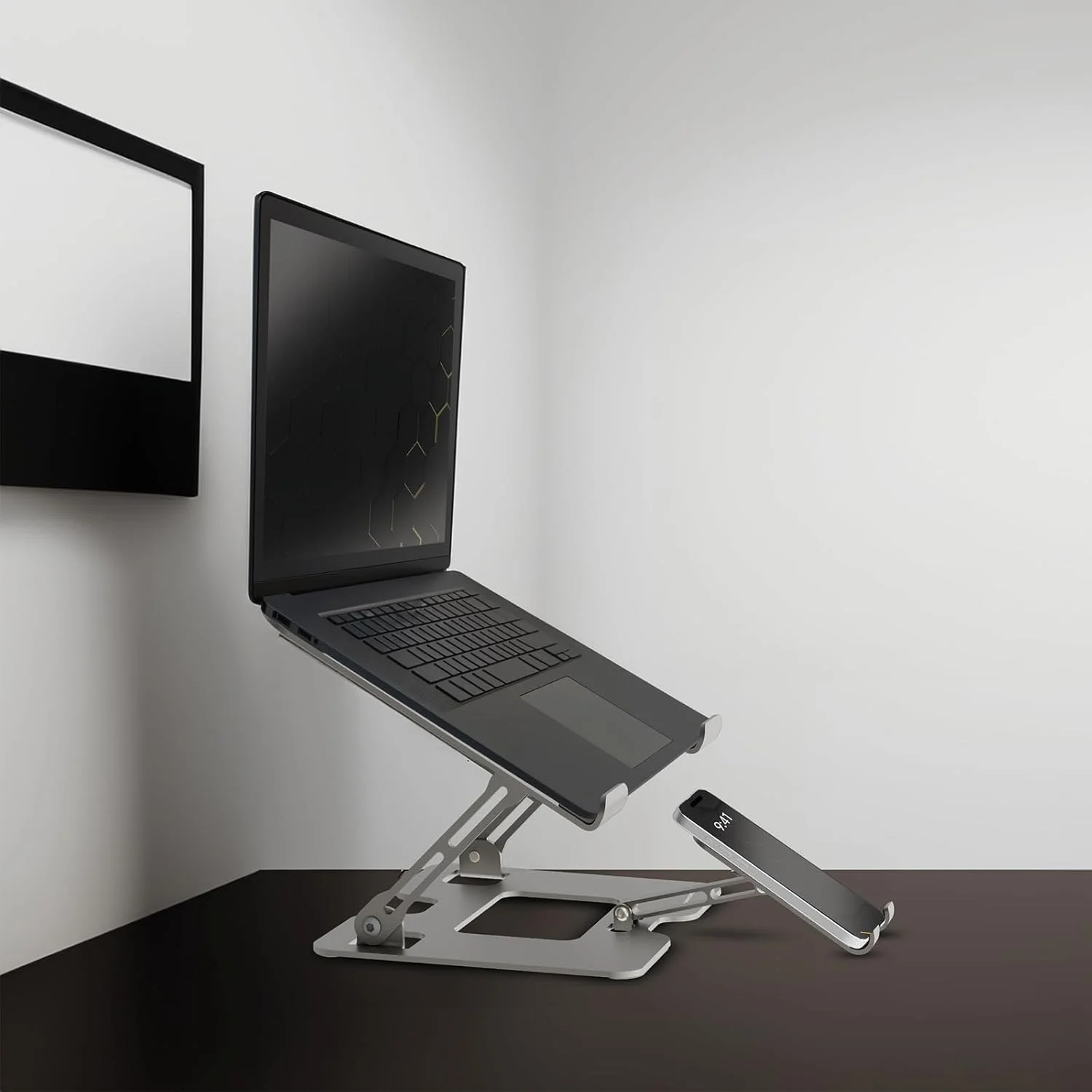 پایه تاشو هوشمند چند منظوره پورودو با پایه تلفن، ارتفاع و زاویه قابل تنظیم، ضد لغزش و ایمن، مستحکم و قابل حمل، سازگار با لپ تاپ ها و تبلت های 10 تا 17 اینچی - نقره ای پایه تاشو هوشمند چند منظوره پورودو با پایه تلفن، ارتفاع و زاویه قابل تنظیم، ضد لغزش و ایمن، مستحکم و قابل حمل، سازگار با لپ تاپ ها و تبلت های 10 تا 17 اینچی - نقره ای