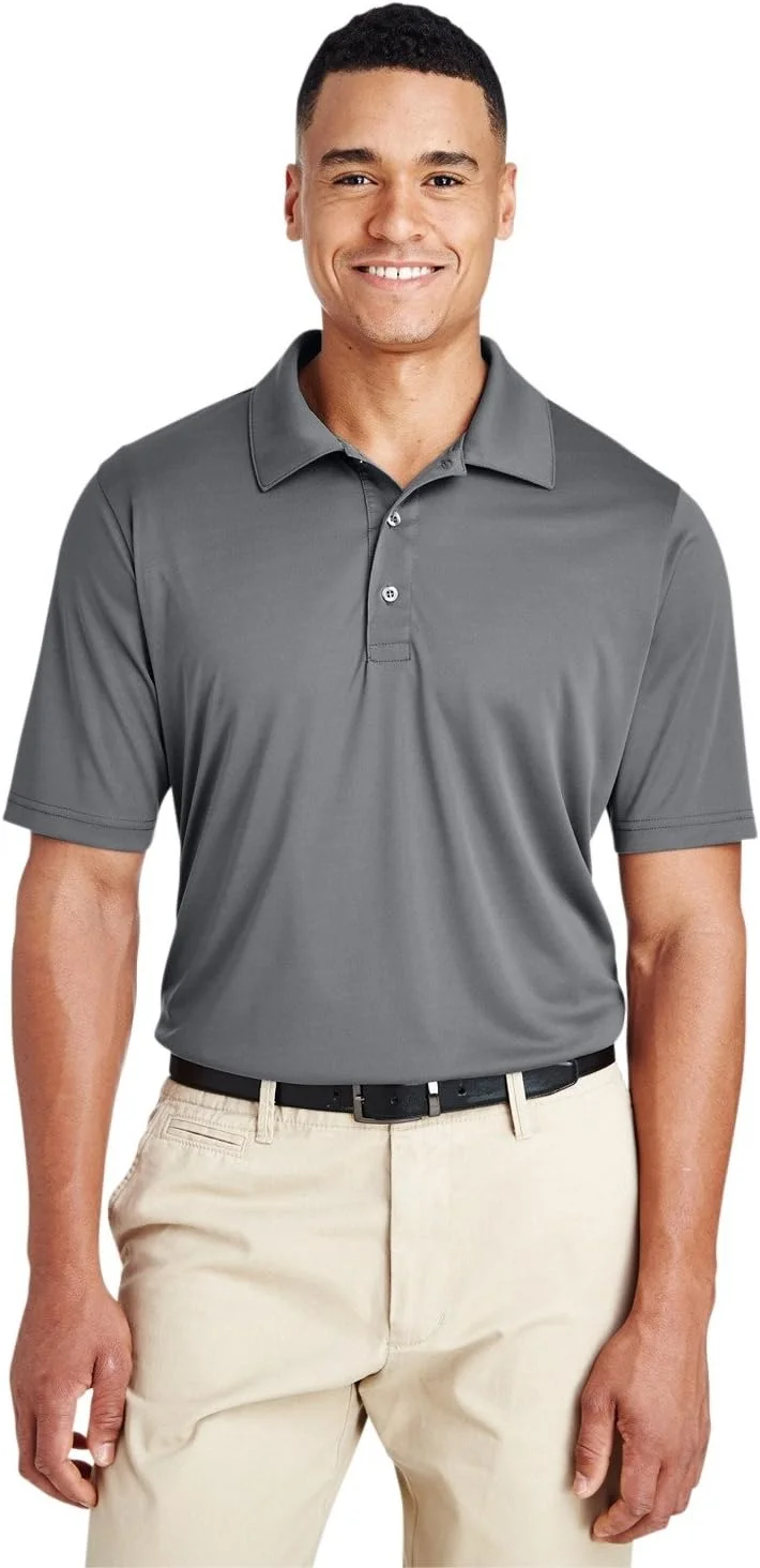 پولوی عملکرد زون مردانه تیم 365. سبک وزن، پارچه توری 100% پلی استر 3.8oz با قابلیت جذب رطوبت و محافظت در برابر اشعه ماوراء بنفش. دکمه های همرنگ، برچسب اصلی قابل جابجایی برای راحتی. دارای یک سجاف سه دکمه و رنگ های کاتیونی برای رنگ های زنده و ماندگار. موجود در رنگ های مشکی، سرمه ای تیره، جنگلی، گرافیتی، آبی روشن، قرمز، سلطنتی و سفید. سایزها از XS تا 6XL متغیر است.