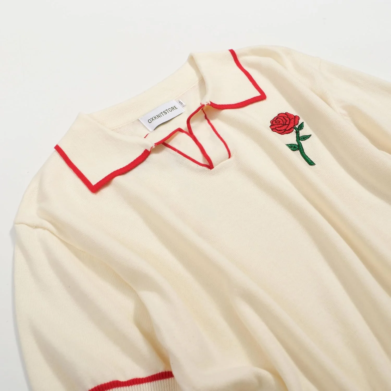 پیراهن پولو بافتنی مردانه آکس‌نیت، آستین کوتاه، یقه هفت، طرح گل رز گلدوزی شده، مناسب استایل کژوال، کار و ورزش