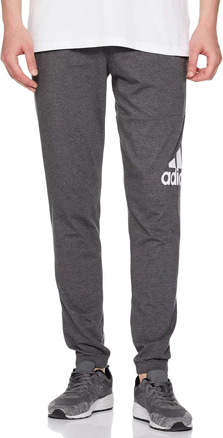 شلوار جاگر مردانه آدیداس Essentials Single Jersey Tapered Badge Of Sport (تک عددی)