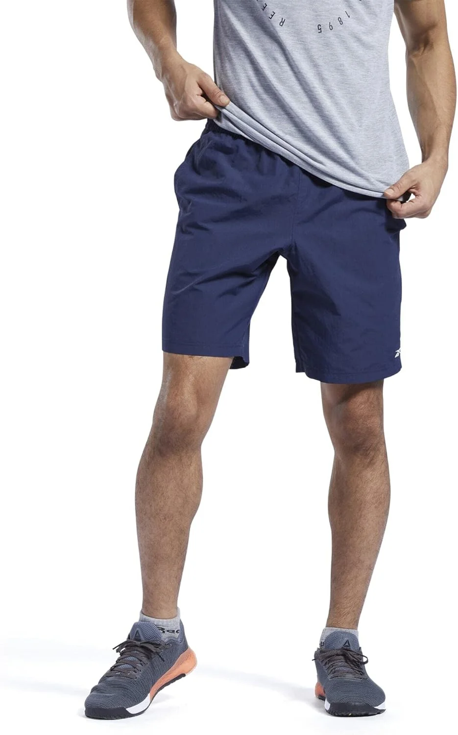 شلوارک ورزشی مردانه ریباک مدل Id Train Utility Short