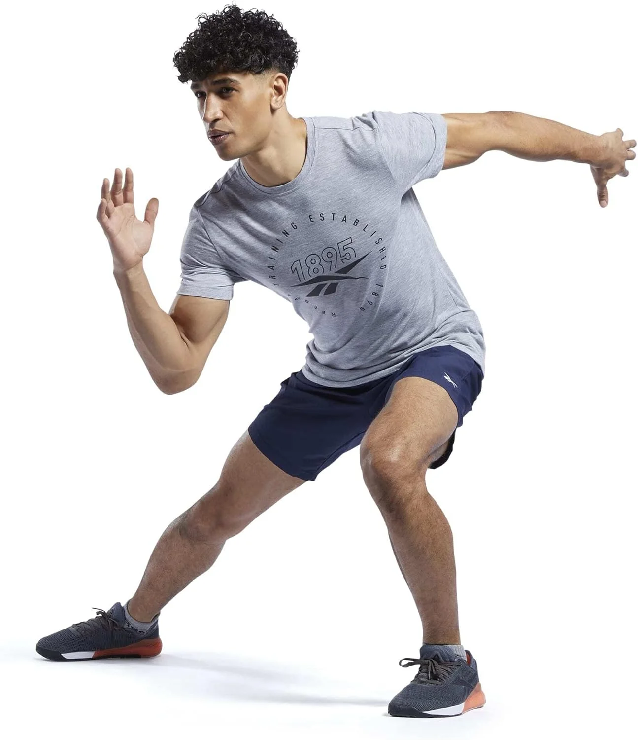 شلوارک ورزشی مردانه ریباک مدل Id Train Utility Short