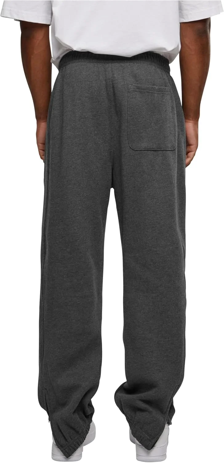 شلوار ورزشی مردانه Urban Classics، شلوار جاگر بند دار، شلوار ورزشی با کمر کشی، شلوار گرمکن با مچ پا زیپ دار کشی، مدل آزاد (تک عددی)