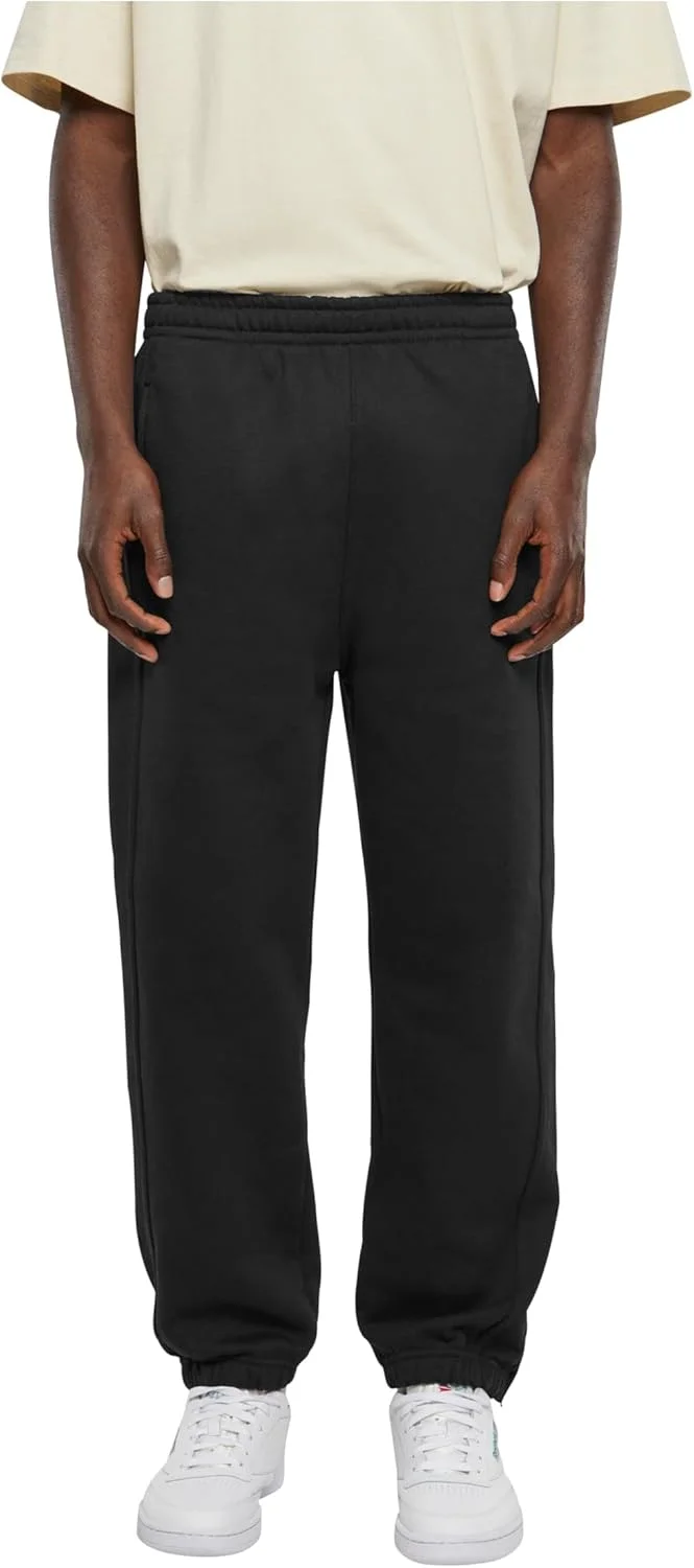 شلوار ورزشی مردانه Urban Classics مدل TB014B، شلوار جاگر بند دار، شلوار ورزشی با کمر کشی، شلوار گرمکن با مچ زیپ دار کشی، فیت آزاد (تک عددی) شلوار ورزشی مردانه Urban Classics مدل TB014B، شلوار جاگر بند دار، شلوار ورزشی با کمر کشی، شلوار گرمکن با مچ زیپ دار کشی، فیت آزاد (تک عددی)