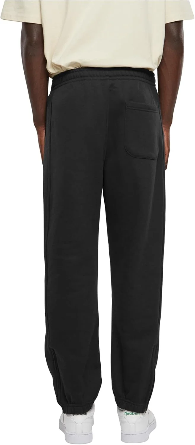 شلوار ورزشی مردانه Urban Classics مدل TB014B، شلوار جاگر بند دار، شلوار ورزشی با کمر کشی، شلوار گرمکن با مچ زیپ دار کشی، فیت آزاد (تک عددی) شلوار ورزشی مردانه Urban Classics مدل TB014B، شلوار جاگر بند دار، شلوار ورزشی با کمر کشی، شلوار گرمکن با مچ زیپ دار کشی، فیت آزاد (تک عددی)