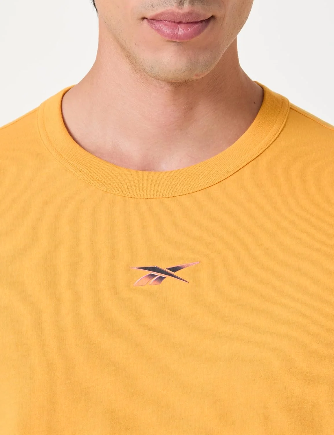 تی شرت مردانه ریباک مدل Athlete Hype رنگ ELECTRIC AMBER سایز M