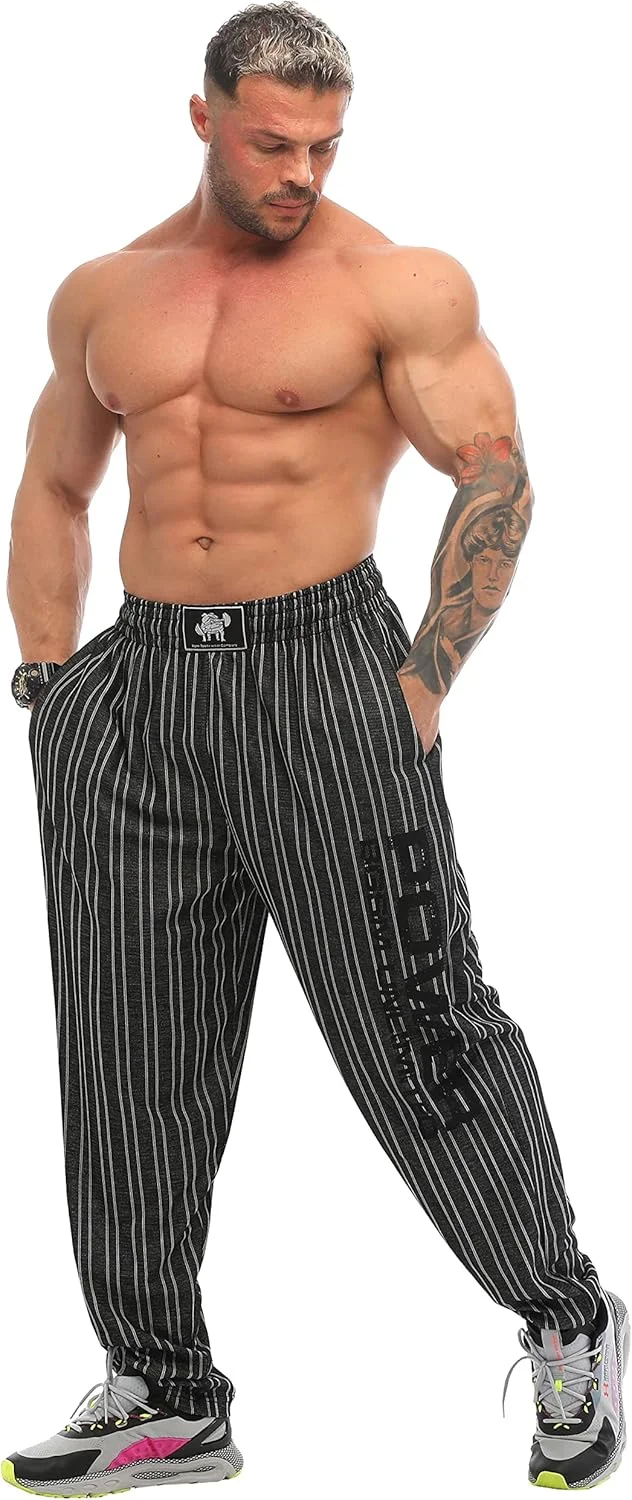 شلوار گرمکن مردانه گشاد با جیب، شلوار ورزشی آزاد مدل قدیمی شلوار گرمکن مردانه گشاد با جیب، شلوار ورزشی آزاد مدل قدیمی