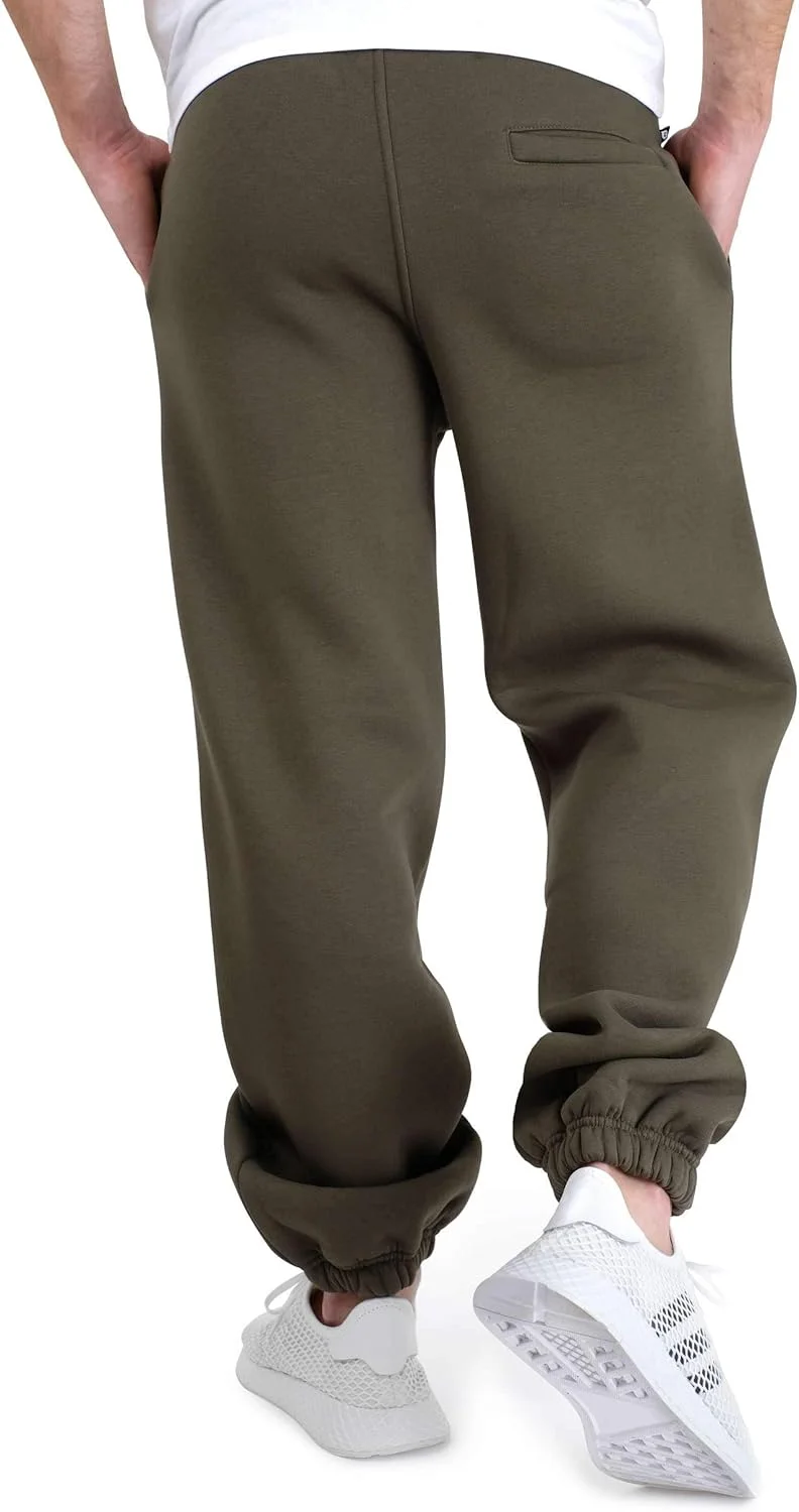 شلوار جاگر مردانه و زنانه زیتونی تیره | شلوار گرم و نرم اسپرت یونیسکس با برش گشاد با 70% پنبه | شلوار راحتی بغل جیب دار