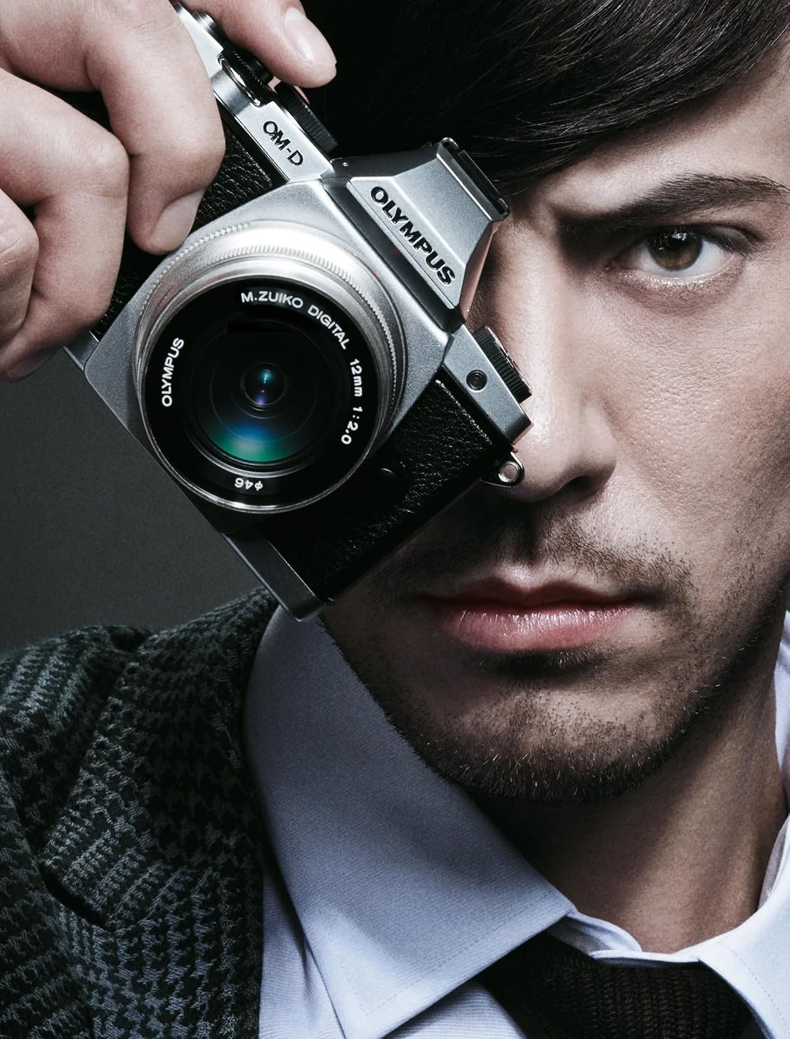 دوربین بدون آینه الیمپوس OM-D E-M5 با سنسور 16 مگاپیکسلی Live MOS و صفحه نمایش لمسی OLED 3.0 اینچی چرخان [فقط بدنه] نقره ای - نسخه بین المللی