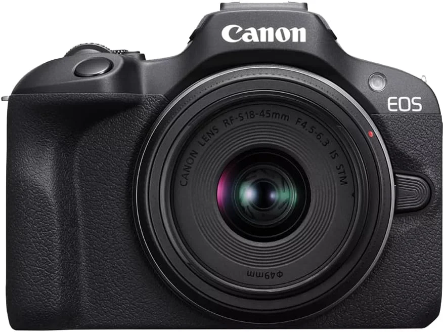 دوربین بدون آینه Canon EOS R100 با لنز RF-S 18-45mm F4.5-6.3 is STM به همراه کیف عکاسی Deco Gear + میکروفون + تک پایه + نرم افزار و کیت لوازم جانبی