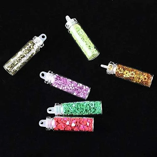 بلیشیا ۴۸ بطری تزئین ناخن سه بعدی شامل نگین، الماس، پولک، اکلیل، مهره های کریستالی فلزی و طرح های کریسمس