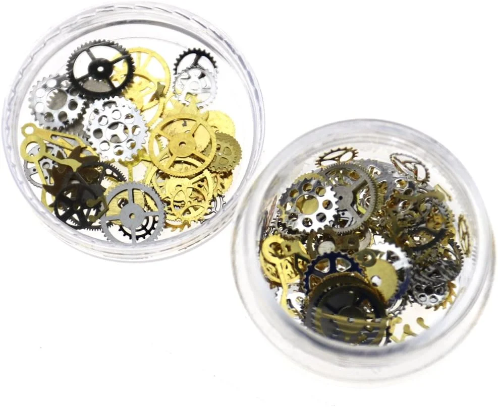 تزئینات ناخن طرح چرخ دنده استیم پانک طلایی