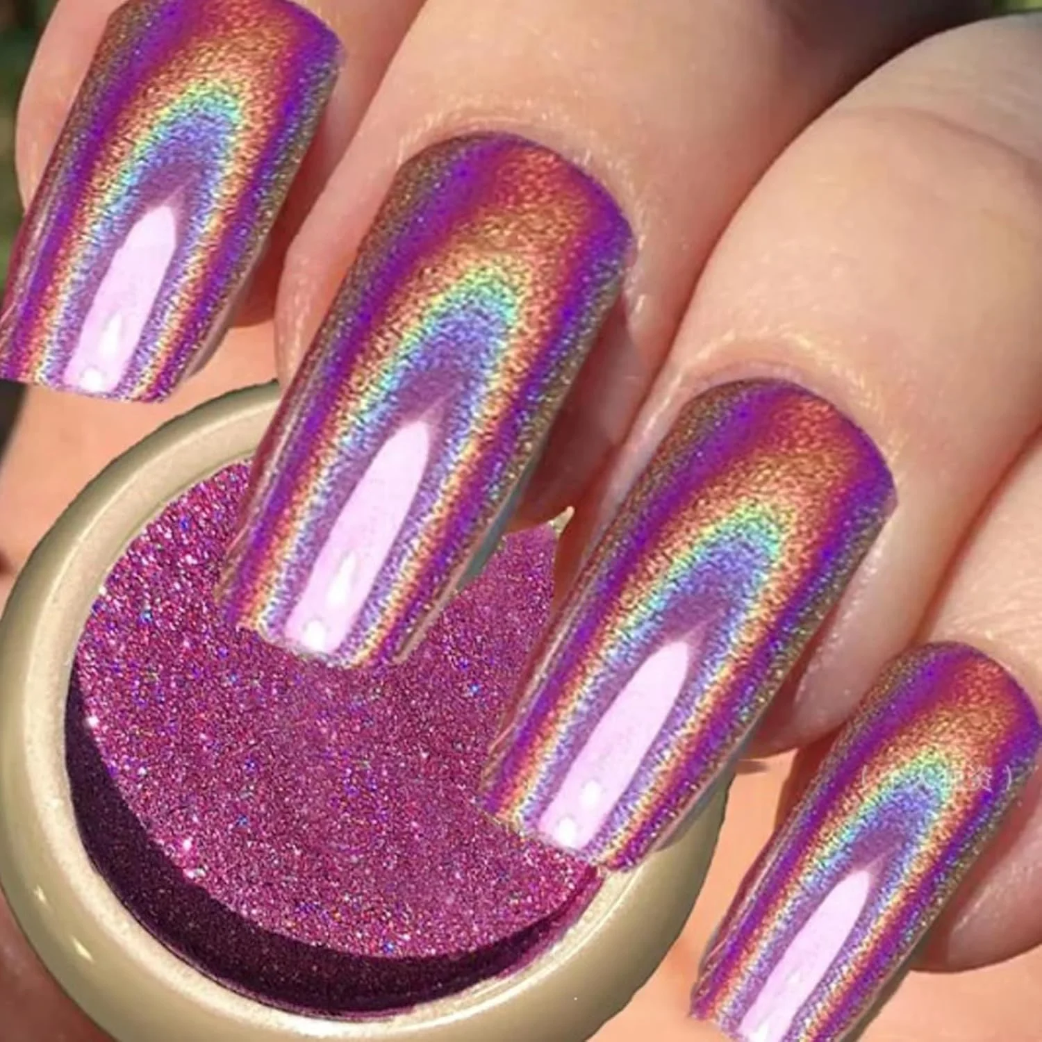 پودر ناخن کروم هولوگرافیک صورتی، پودر کروم صورتی با جلوه آینه‌ای رنگین کمانی لیزری، پودر هولوگرافیک برای ناخن‌ها، پودر کروم لاک ژل برای طراحی و تزئین ناخن