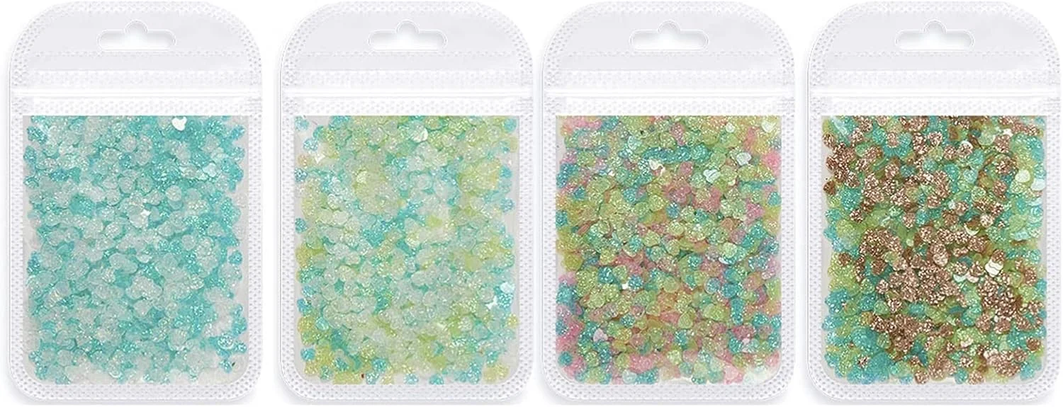 یک بسته پولک ناخن تزئینی، با جلوه بصری براق، درخشان، بازتابنده نور، پولک های ظریف