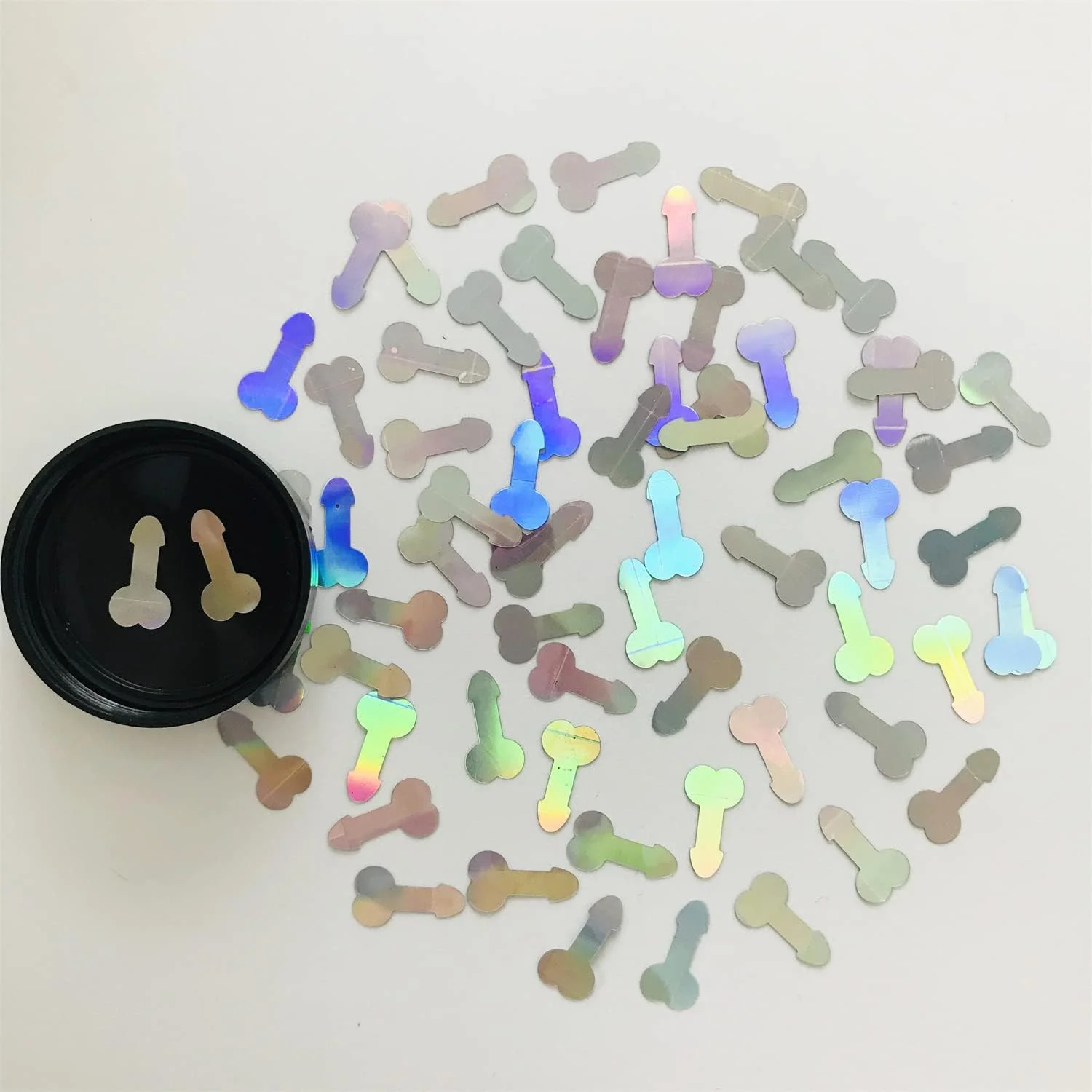 اکلیل های نقره ای هولوگرافیک با اشکال جالب برای ساخت زیورآلات رزینی، هنرهای دستی، طراحی ناخن و لوازم آرایشی - بسته 10 گرمی