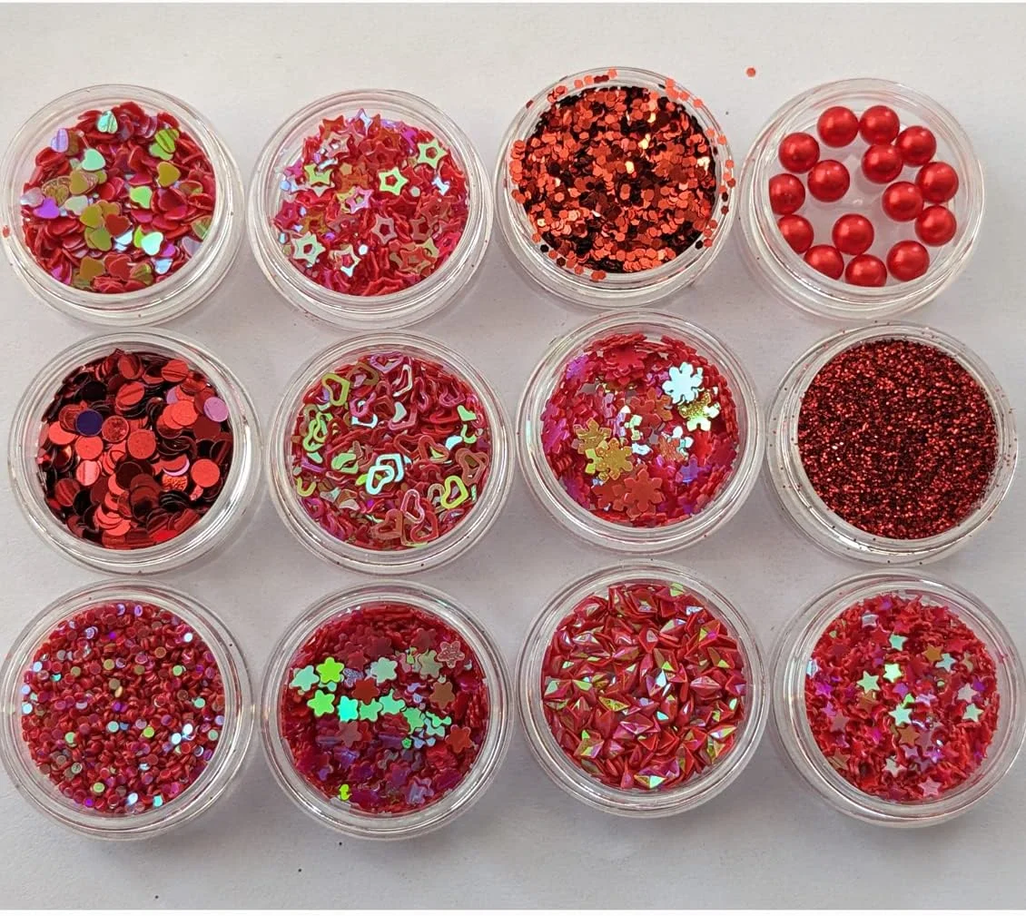 ست طراحی ناخن شامل 12 عدد نگین بدلی به وزن 2 گرم قرمز