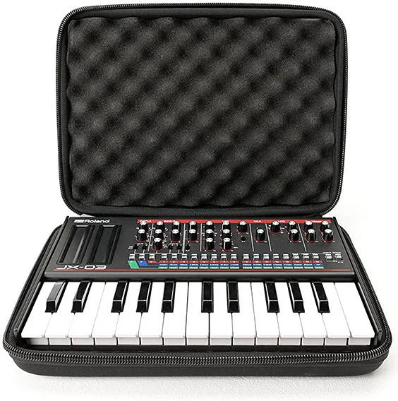 کیف حمل ماگما مدل CTRL Case Boutique Key، برای ماژولهای Roland Boutique به همراه کیبورد K-25m، فوم EVA Durashock سخت، زیپ محکم، سبک و جمع و جور، دستههای حمل راحت، مشکی | 48003 کیف حمل ماگما مدل CTRL Case Boutique Key، برای ماژولهای Roland Boutique به همراه کیبورد K-25m، فوم EVA Durashock سخت، زیپ محکم، سبک و جمع و جور، دستههای حمل راحت، مشکی | 48003