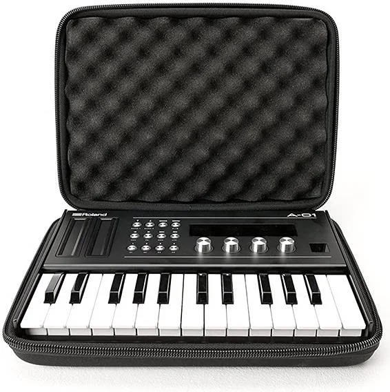 کیف حمل ماگما مدل CTRL Case Boutique Key، برای ماژولهای Roland Boutique به همراه کیبورد K-25m، فوم EVA Durashock سخت، زیپ محکم، سبک و جمع و جور، دستههای حمل راحت، مشکی | 48003 کیف حمل ماگما مدل CTRL Case Boutique Key، برای ماژولهای Roland Boutique به همراه کیبورد K-25m، فوم EVA Durashock سخت، زیپ محکم، سبک و جمع و جور، دستههای حمل راحت، مشکی | 48003