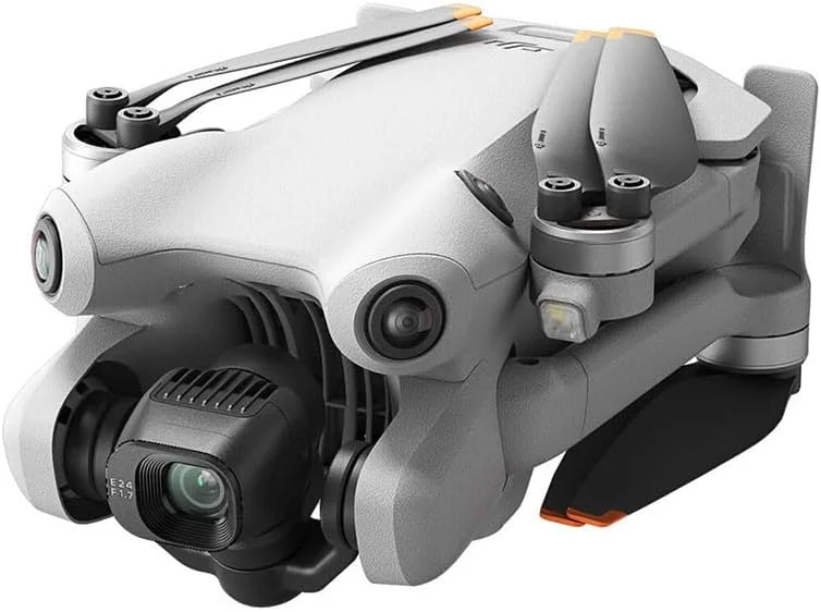 DJI Mini 4 Pro (DJI RC-N2)، مینی پهپاد تاشو با دوربین فیلمبرداری 4K HDR، زیر 249 گرم، 34 دقیقه زمان پرواز، 20 کیلومتر مسافت انتقال، دارای گواهی MOIAT، نسخه امارات متحده عربی، پشتیبانی رسمی