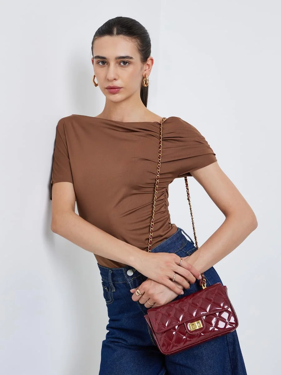 کیف دستی زنانه استایلی طرح دار با قفل چرخشی - زرشکی