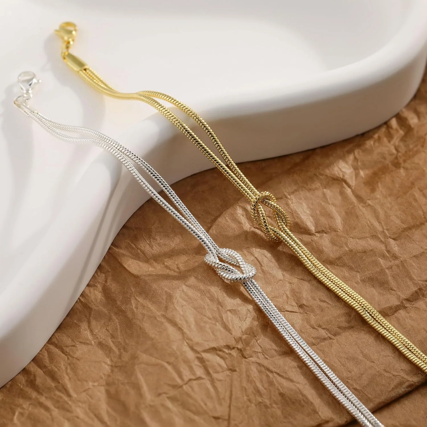 دستبند نقره ای تزویق زنانه، دستبند ترند زنانه با آبکاری الکتریکی، زنجیر چند لایه، دستبند مهره ای گره مرواریدی طرح قلب