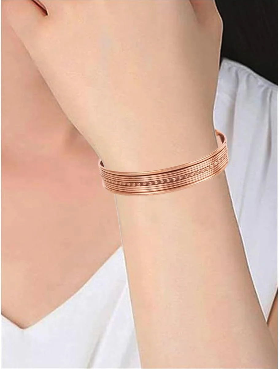 دستبند مسی دست ساز تاچ استون، دست ساز با مس خالص و ضخیم، طرح مارپیچ چشم نواز به سبک تبتی، ظرافت مینیمالیستی، دستبند مسی خالص دو رنگ.