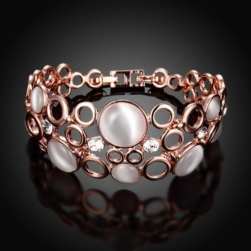 دستبند النگویی طلایی رنگ زنانه یوتبلا مناسب مهمانی (رزگلد) (YBBN_91640) دستبند النگویی طلایی رنگ زنانه یوتبلا مناسب مهمانی (رزگلد) (YBBN_91640)