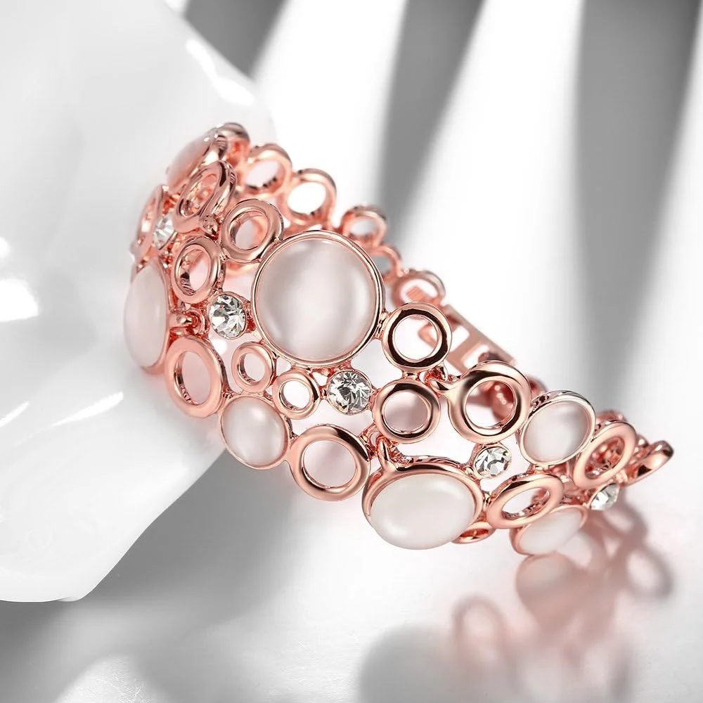 دستبند النگویی طلایی رنگ زنانه یوتبلا مناسب مهمانی (رزگلد) (YBBN_91640) دستبند النگویی طلایی رنگ زنانه یوتبلا مناسب مهمانی (رزگلد) (YBBN_91640)