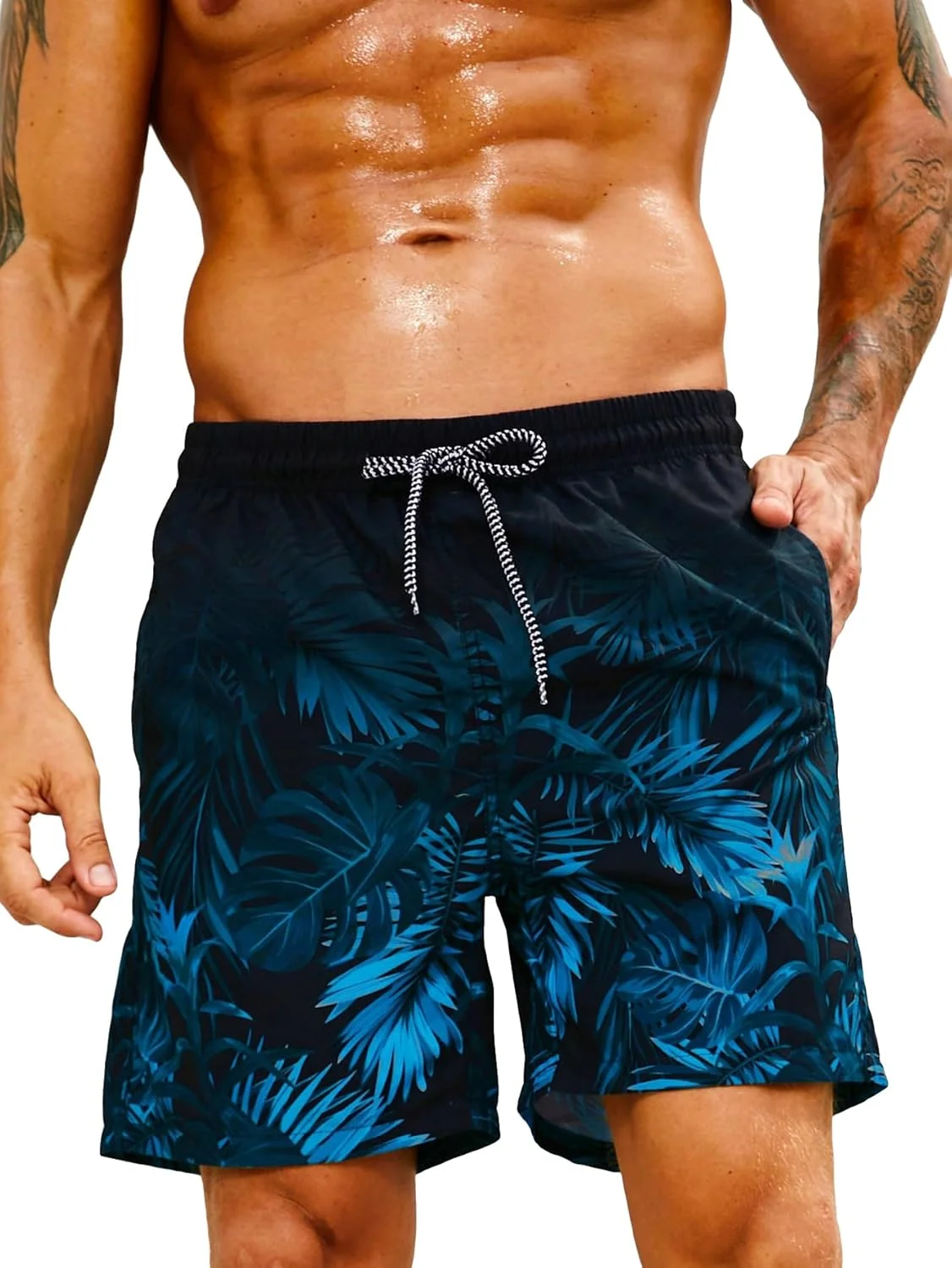 شلوارک شنا مردانه GORGLITTER با طرح گرمسیری، کمر کشی و بند دار، دارای جیب های مورب مناسب فصل تابستان شلوارک شنا مردانه GORGLITTER با طرح گرمسیری، کمر کشی و بند دار، دارای جیب های مورب مناسب فصل تابستان