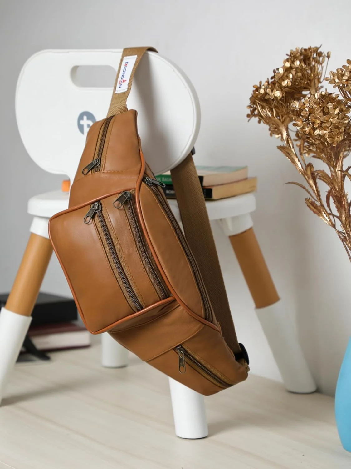 کیف کمری چرمی شیک K London، رنگ قهوه ای روشن، مدل زیبا و مناسب سفر، دارای جای گذرنامه و بند قابل تنظیم (1452_Tann) کیف کمری چرمی شیک K London، رنگ قهوه ای روشن، مدل زیبا و مناسب سفر، دارای جای گذرنامه و بند قابل تنظیم (1452_Tann)